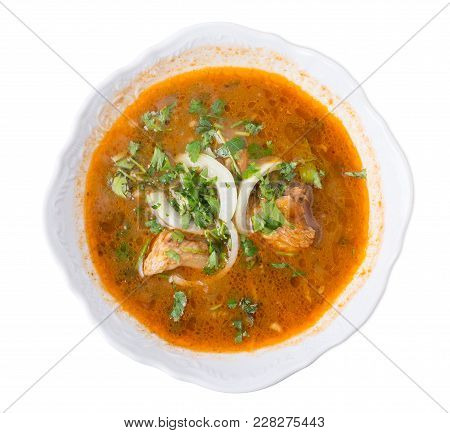 Georgian Kharcho Beef Soup With Onions And Tomatoes. Isolated On A White Background.