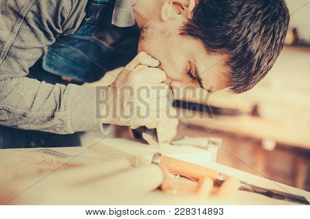 Wood Processing. Joinery Work. Wood Carving. The Carpenter Uses A Cutting Knife For Framing. Toned I