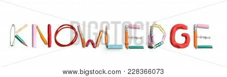 Concept Of Idea With Colorful Crumpled Paper. The Word Knowledge Created From Office Stationery. The