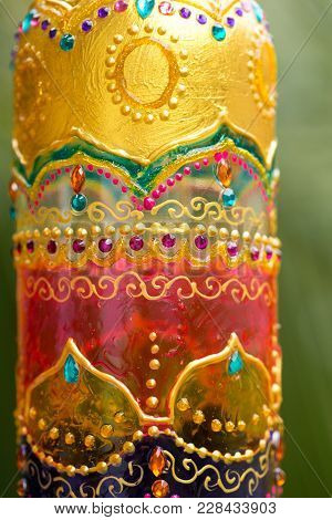 Decorative Glass Bottle Is Painted And Decorated With Rhinestones