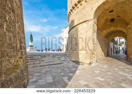 Otranto, Italy - April 11, 2010: People Valking Near The Alfonsina Tower