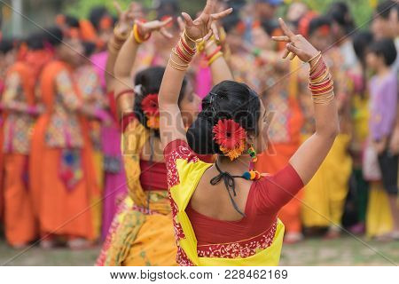 Young Girls Dancing At Holi / Spring Festival.