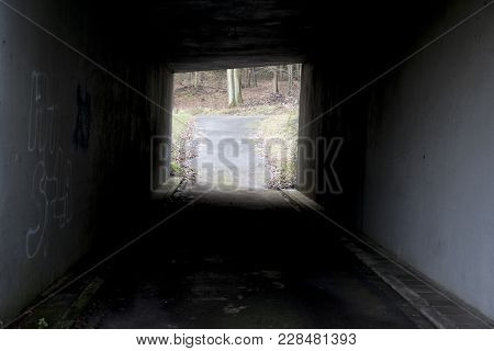 Looking Through A Tunnel At A Part Of The Odenwald In Germany
