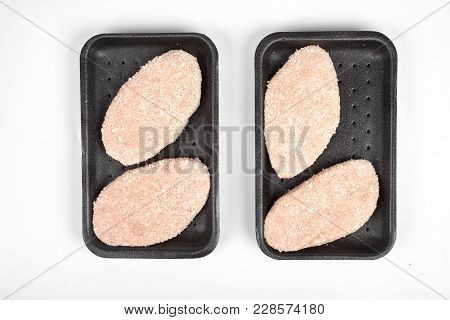 Delicious Chicken Cutlet In Package. Isolated On A White Background