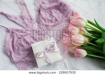 Beautiful Lace Lingerie. Cosmetics, Decorations, A Bouquet Of Tulips. Gift. A Box With A Gift. Inter