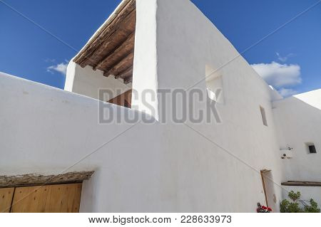 Santa Eularia Des Riu, Spain- January 12, 2018: Ancient House And Windmill Can Planetes,nowadays Is 