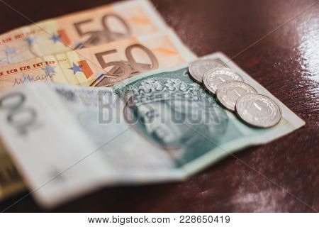 Fifty Euro And Banknotes On The Table