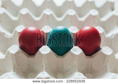 Easter Eggs Of Different Colors In Tray Background