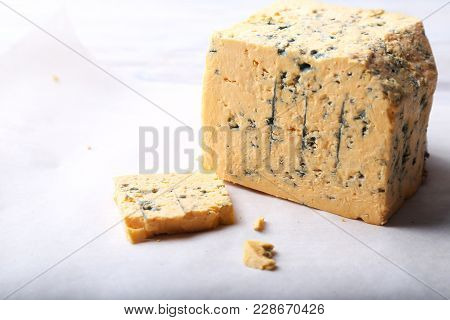 Mature Blue Stilton Cheese On Light Background