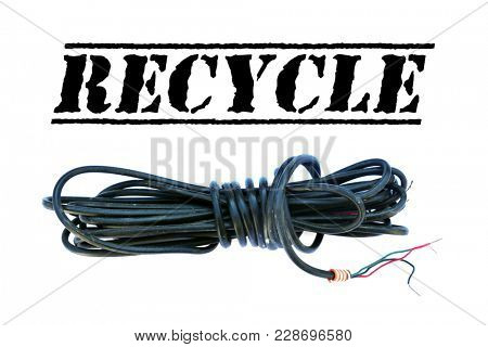 Copper Wire Scrap isolated on white with room for your text. Plastic coated electrical copper wire on white.