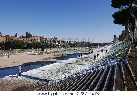 Rome, Italy -  February 26, 2018: People In The Circo Massimo, Romans Enjoy The First Snow In Years