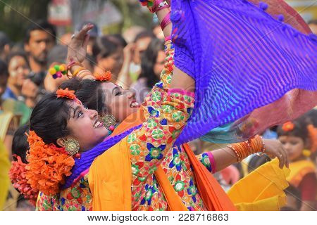 Young Girls Dancing At Holi / Spring Festival.
