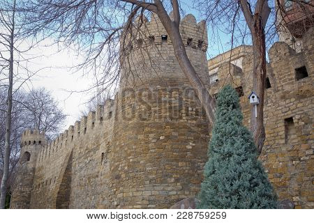 The Fortress Gates Of The Old City In The Illumination . Icheri Sheher In Baku. Azerbaijan . Gate Of