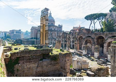 Historic Ruins Of The Famous Roman Forum Heritage Site In Rome Italy On A Sunny Day With Blue Sky An