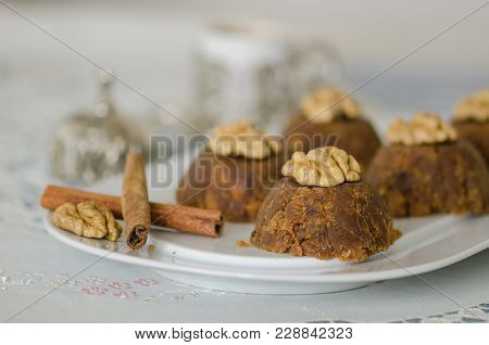 Flour Halva With Walnut And Cinnamon On The White Serving.it Is Made With Flour And Oil Roasted And 