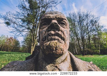 April, 10th, 2017 - Potsdam, Brandenburg, Germany. Abandoned Lenin Stone Bust In Volkspark In Potsda