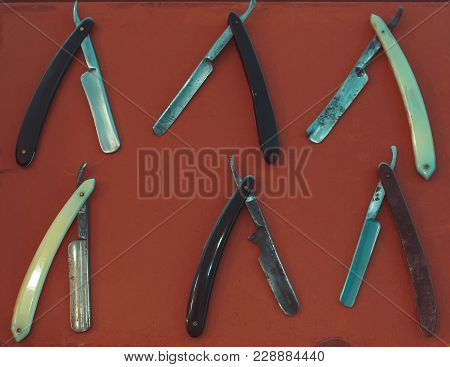 Razor On Res Background. Straight Razor For Men's Grooming.