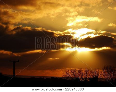 Sun Shines Through The Clouds Morning Silhouette