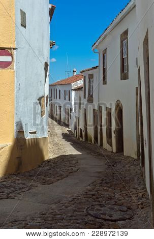Sunny Day In Portugal Old Buildings Wite Walls