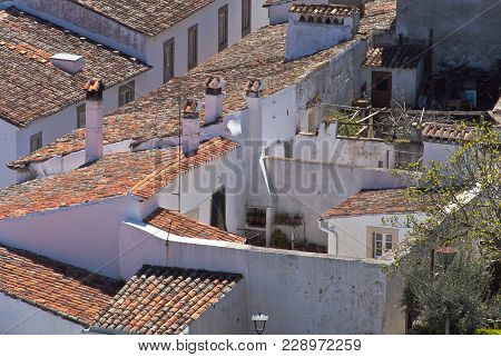 Sunny Day In Portugal Old Buildings Wite Walls