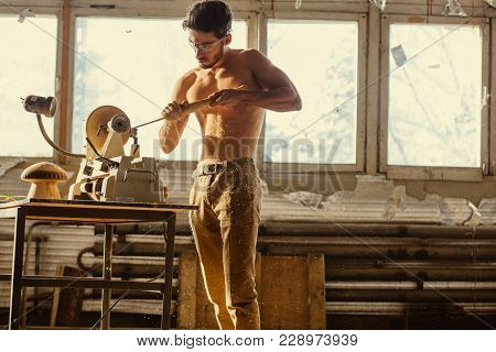 Wood Lathe, Lathe Naked Operator Working A Wood Pestle