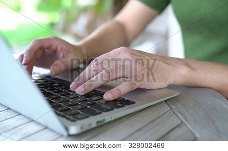 Woman's Hands Busy Typing On Keyboard. Flexi Work Concept.