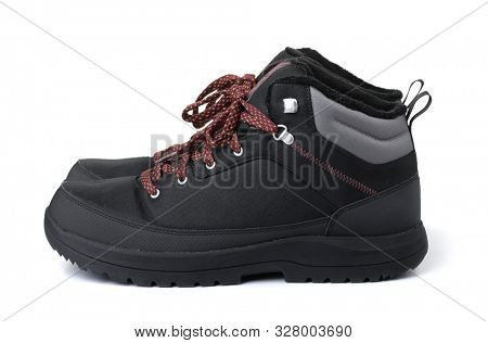  Side view of dlack waterproof hiking boots isolated on white