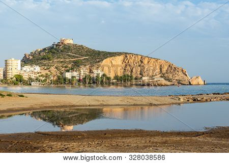 View Of The Beach Of The Village Of Águilas, Murcia, With The Rock Of The Snorer.