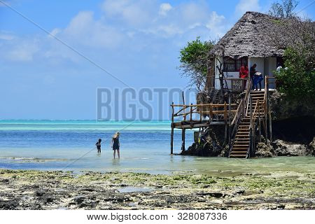 Pingwe, Zanzibar - October 6, 2019: Tourists Visit The Rock Restaurant. It Is World-famous Restauran
