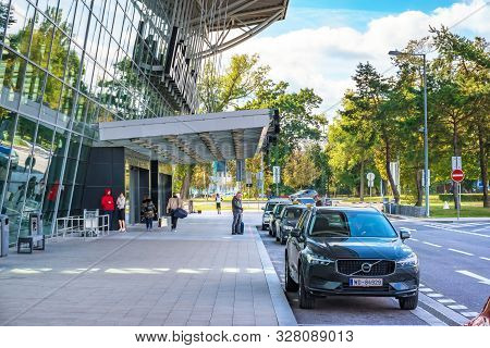 Bratislava, Slovakia - October 6 2019: Passengers And Cars In Front Of Departure Hall Of Bratislava 