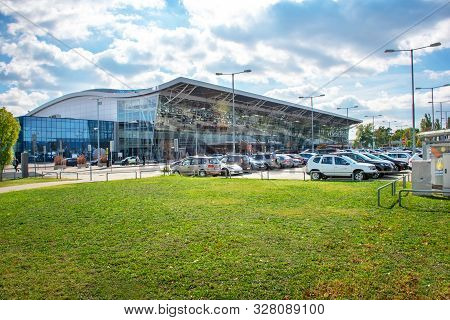 Bratislava, Slovakia - October 6 2019: View Of Bratislava Airport Terminal With Parking Lot Full Of 