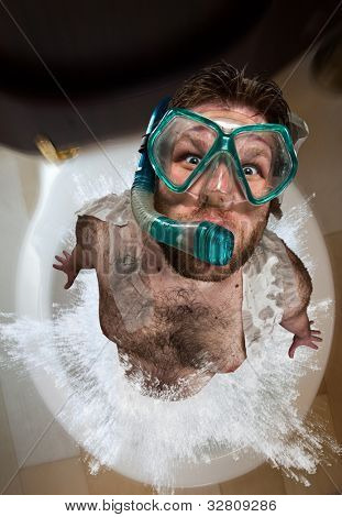 Bizarre man with swimming mask leaping out from toilet