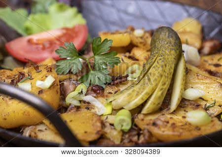 Closeup Of Rustic Tyrolean Groestl On Wood