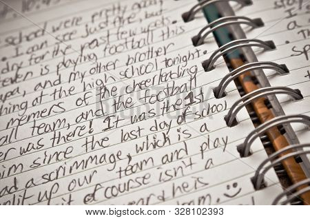 Handwritten Diary Entry In A Notebook By A Teenager