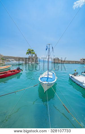 Nafpaktos, Greece - July 22 2019; Picturesque Fortified Small Medieval Port Of Nafpaktos Greece.