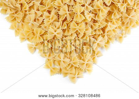 A Variety Of Types And Shapes Of Italian Pasta. Dry Pasta Bows Farfalle.  Heap Of Bow Tie Macaroni I