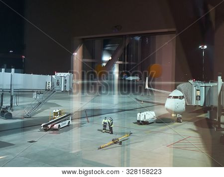 Platov Airport, Rostov-on-don, Russia - May 2019. Airport Employees, Jetways And Aircrafts On The Ai
