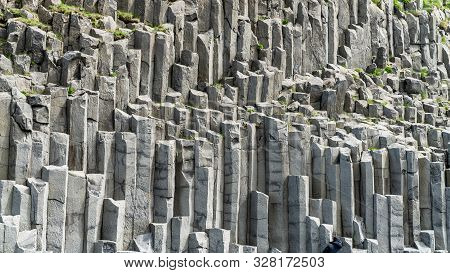Basalt Columns Geological Formation At Reynisfjara Beach, Southern Coast Of Iceland