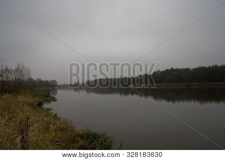 Beautiful Polish Autumn Cold Gray Cloudy November Landscape Of Podlasie With The River Bug
