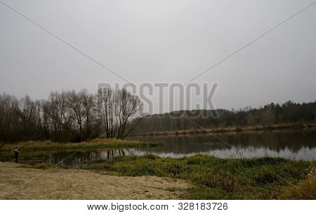 Beautiful Polish Autumn Cold Gray Cloudy November Landscape Of Podlasie With The River Bug
