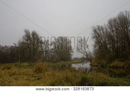 Beautiful Polish Autumn Cold Gray Cloudy November Landscape Of Podlasie With The River Bug