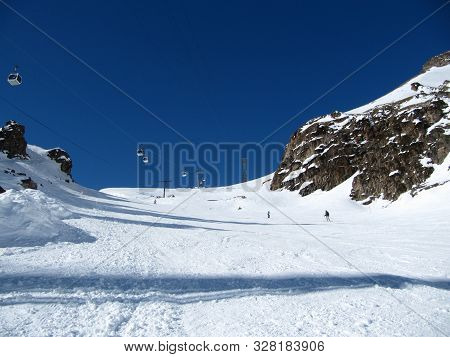 Azau Valley, Mount Elbrus, Russian Federation - Feb, 2010: People Are Skating Skiing On The Slope In