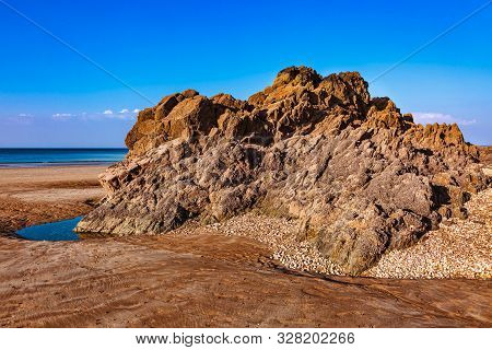 Wild Rocky Beach In Brittany On Armor Coastline.