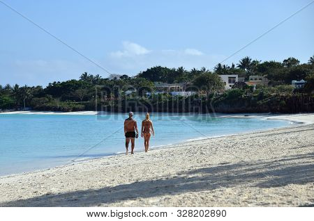 Kendwa, Zanzibar - October 3, 2019: Kendwa Resort, Beautiful Beach With White Sand And Tourist Coupl