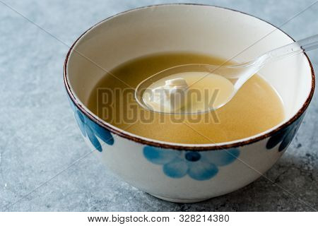 Japanese Food Miso Soup With Tofu And Seaweed In Ceramic Bowl.