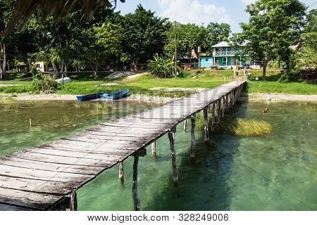 View From The Wooden Dock Tothe Lake Side, El Remate, Guatemala