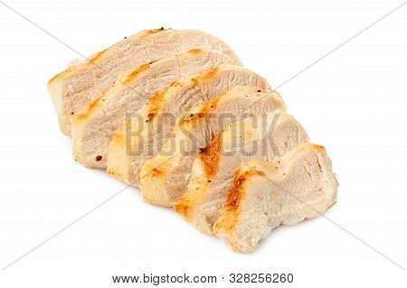 Sliced Grilled Chicken Breast With Grill Marks, Ground Black Pepper And Salt Isolated On White.