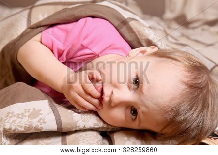 Children's Anxiety. Portrait Of Cule Little Baby Girl.