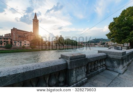 Panoramic View On The Dige River In The Evening In Verona. Italy
