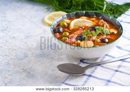 Traditional Soup Hodgepodge In Plate On White Table Copyspace